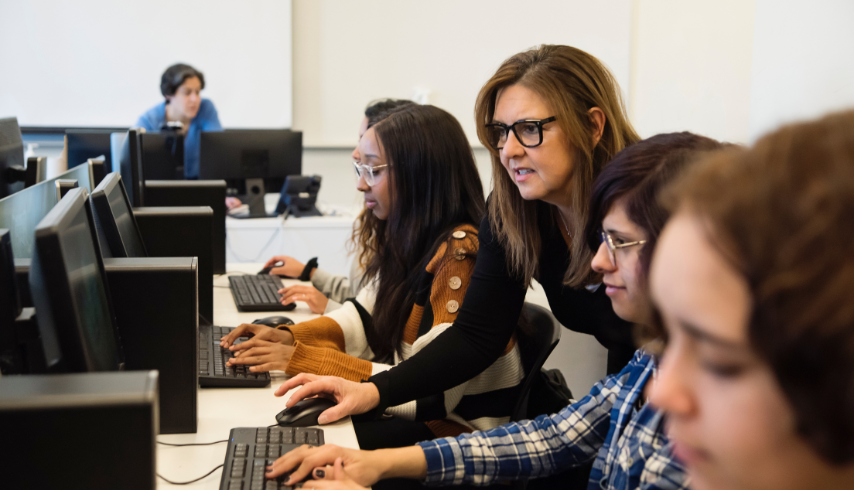 Woman Helping on Computer