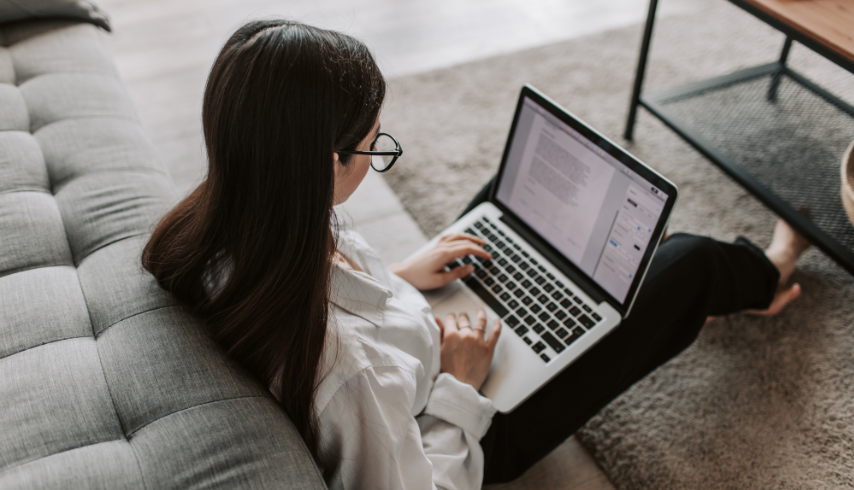 Woman on Laptop in Livingroom