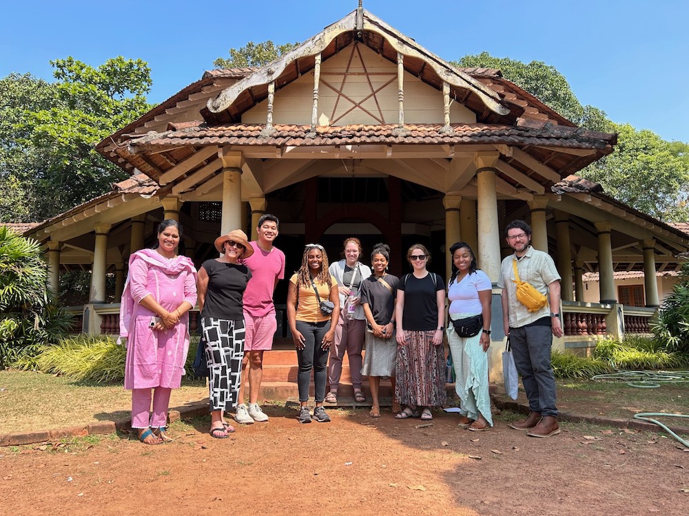 Group in India in front of building